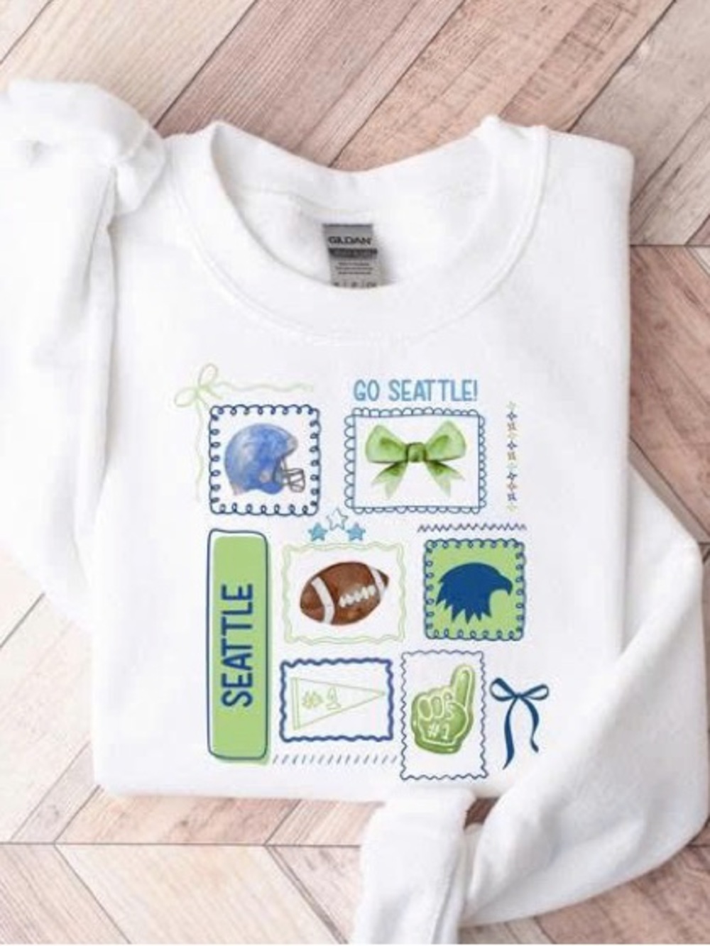 White Seattle Graphic Sweatshirt with Green and Blue Accents